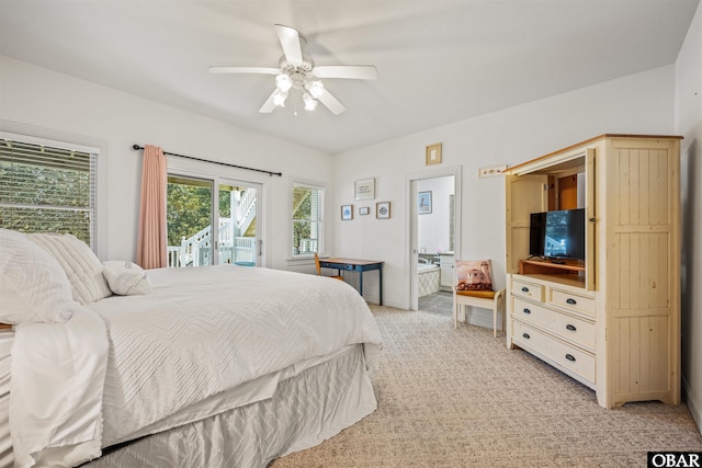 bedroom featuring light colored carpet, a ceiling fan, connected bathroom, and access to outside