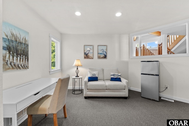 carpeted living room featuring recessed lighting, visible vents, and baseboards