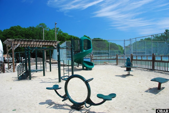 view of property's community with fence