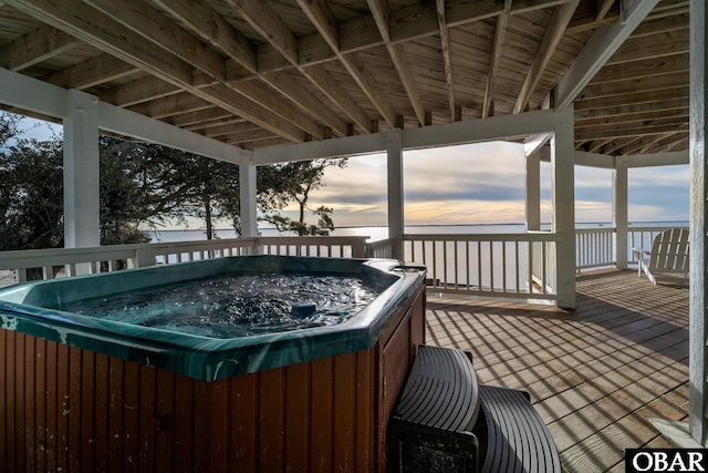 deck with a hot tub