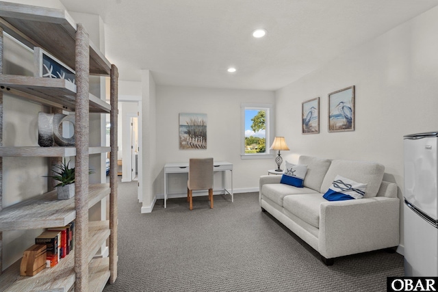 office with recessed lighting, dark carpet, and baseboards