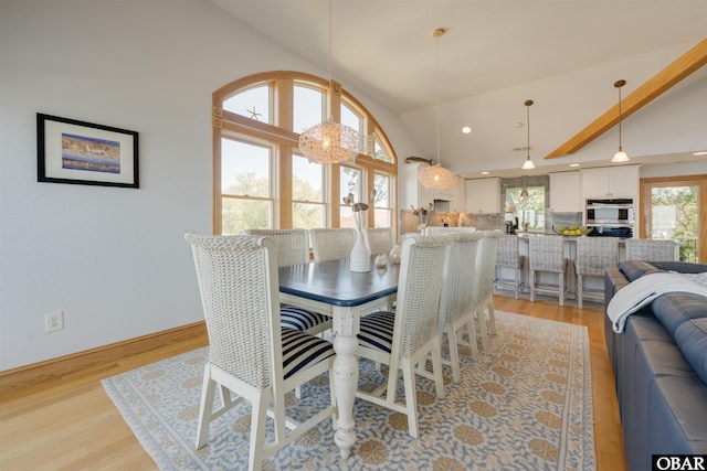 208 Harbour Bay Dr Lot 19, Kitty Hawk, NC 27949 - dining space featuring vaulted ceiling, light wood-style flooring, recessed lighting, and baseboards