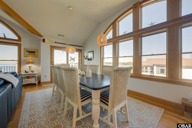 208 Harbour Bay Dr Lot 19, Kitty Hawk, NC 27949 - dining room with wood finished floors, baseboards, and lofted ceiling