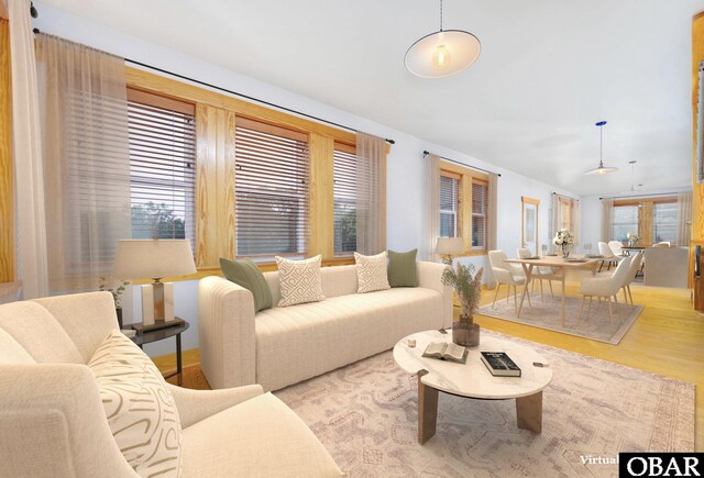 living area with wood finished floors