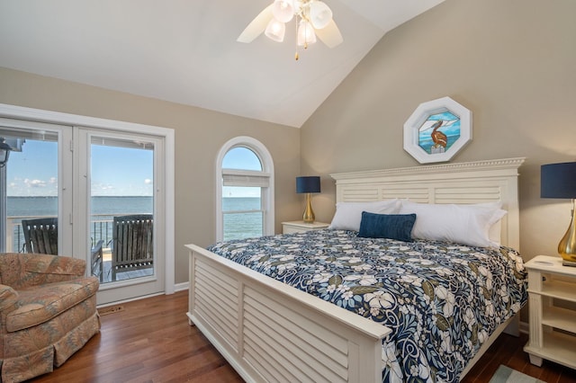 bedroom with access to exterior, vaulted ceiling, a ceiling fan, and wood finished floors