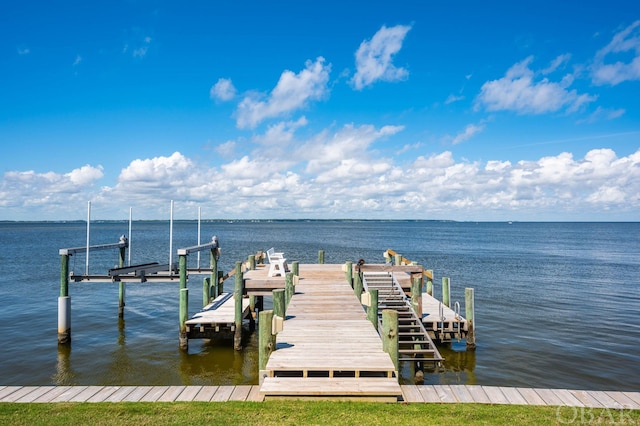 view of dock with a water view and boat lift