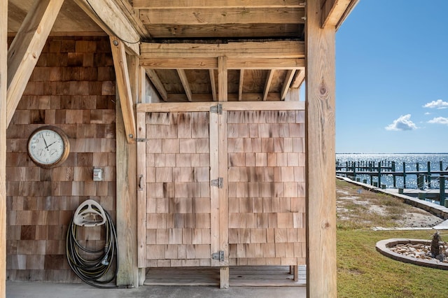 view of outbuilding with a water view
