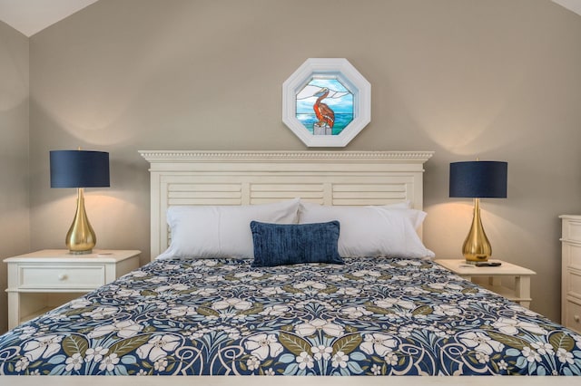 bedroom featuring vaulted ceiling