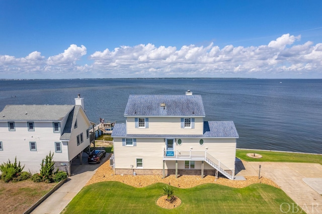 aerial view featuring a water view