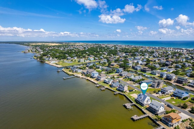 bird's eye view featuring a residential view and a water view