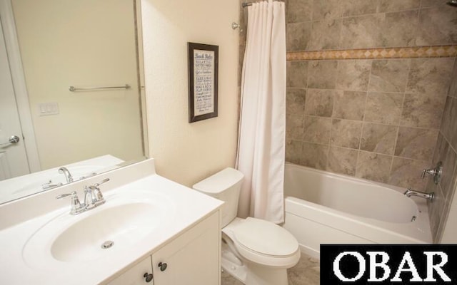 full bathroom featuring vanity, toilet, and shower / tub combo with curtain