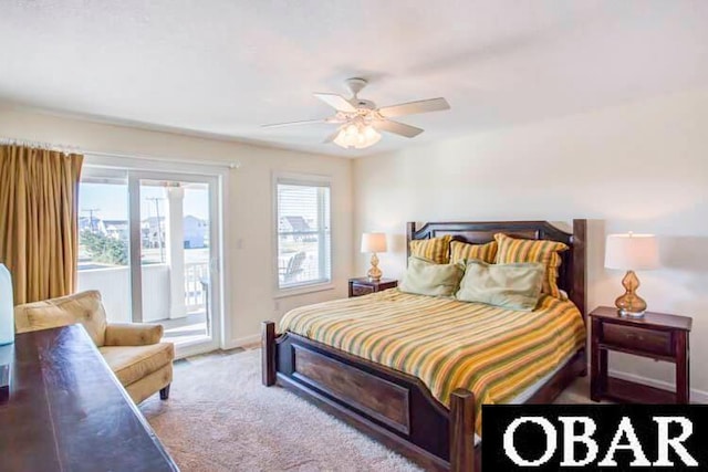 carpeted bedroom featuring access to outside, ceiling fan, and baseboards