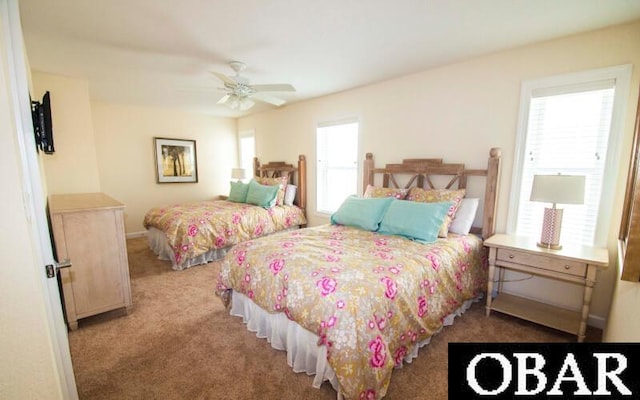 bedroom featuring carpet flooring and a ceiling fan