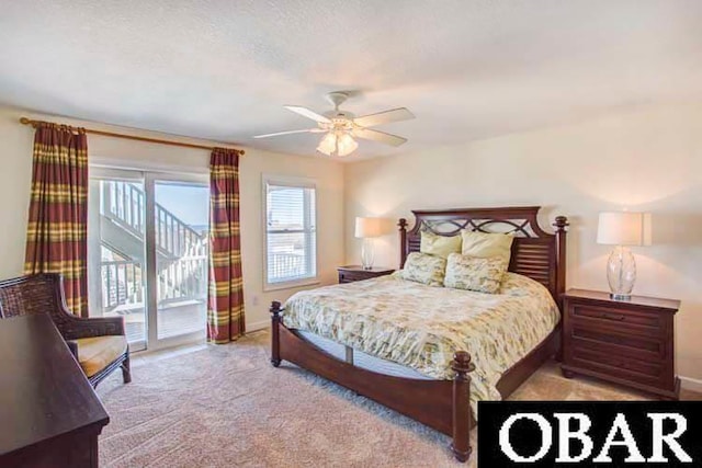 bedroom featuring carpet, access to outside, baseboards, and ceiling fan