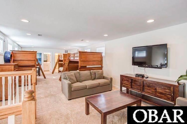 living room with carpet and recessed lighting