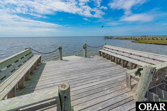 view of dock with a water view