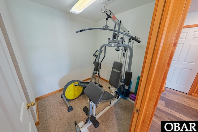 exercise area with baseboards