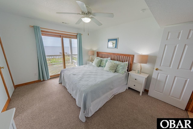 bedroom with carpet, visible vents, ceiling fan, and access to exterior
