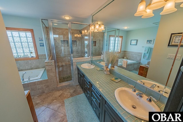 39972 NC-12 Hwy Lot 15, Avon, NC 27915 - full bathroom with double vanity, a garden tub, a stall shower, and a sink