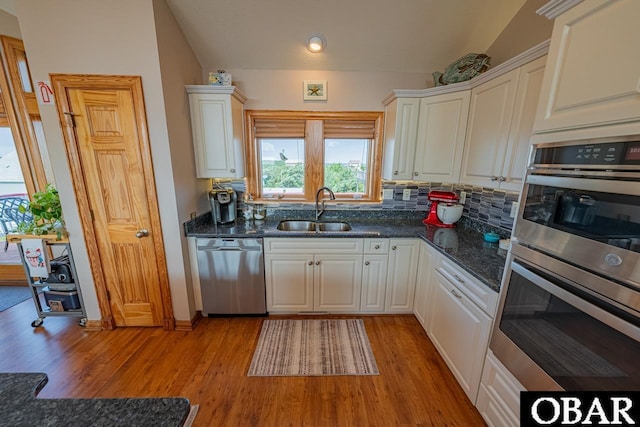 39972 NC-12 Hwy Lot 15, Avon, NC 27915 - kitchen with a sink, lofted ceiling, appliances with stainless steel finishes, and white cabinetry