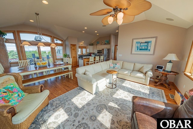 39972 NC-12 Hwy Lot 15, Avon, NC 27915 - living area featuring ceiling fan, baseboards, lofted ceiling, and wood finished floors