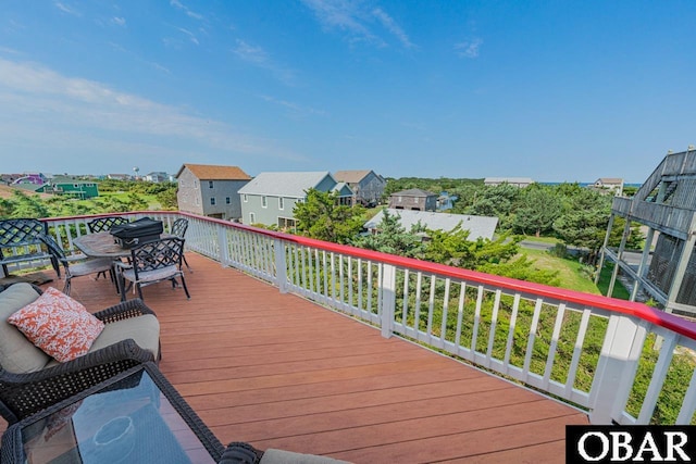 39972 NC-12 Hwy Lot 15, Avon, NC 27915 - wooden terrace featuring outdoor dining space and a residential view