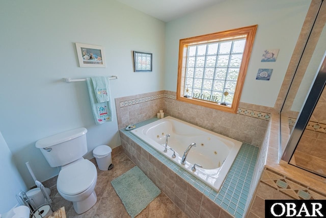 39972 NC-12 Hwy Lot 15, Avon, NC 27915 - bathroom featuring tile patterned floors, a tub with jets, and toilet
