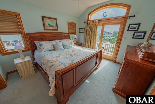 39972 NC-12 Hwy Lot 15, Avon, NC 27915 - bedroom with vaulted ceiling, access to outside, light colored carpet, and baseboards