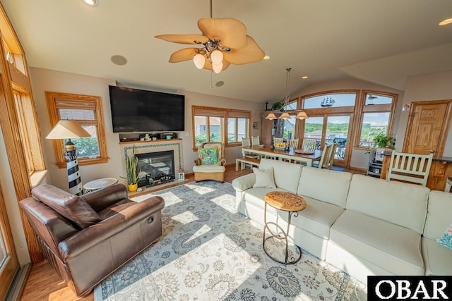 39972 NC-12 Hwy Lot 15, Avon, NC 27915 - living room with a ceiling fan, wood finished floors, a glass covered fireplace, recessed lighting, and vaulted ceiling
