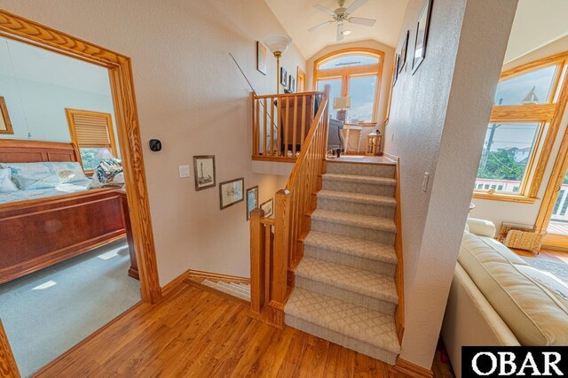 39972 NC-12 Hwy Lot 15, Avon, NC 27915 - stairway with ceiling fan, baseboards, wood finished floors, and vaulted ceiling
