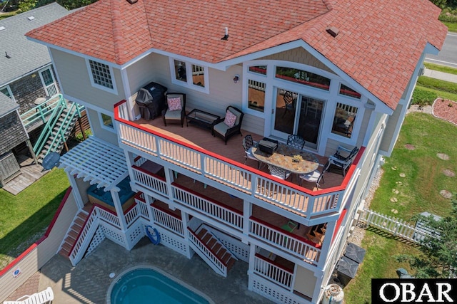 39972 NC-12 Hwy Lot 15, Avon, NC 27915 - exterior space featuring a wooden deck, a lawn, a shingled roof, and a jacuzzi