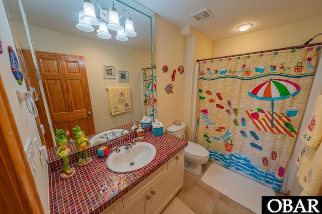 39972 NC-12 Hwy Lot 15, Avon, NC 27915 - bathroom with tile patterned floors, visible vents, toilet, curtained shower, and vanity