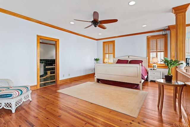 bedroom featuring ornamental molding, light wood finished floors, recessed lighting, and baseboards