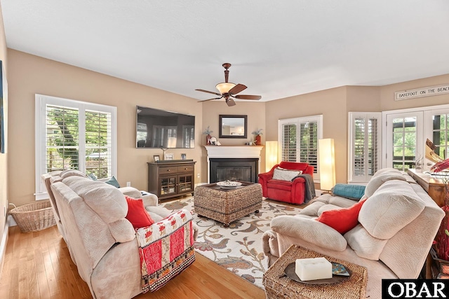 116 Swan View Dr Lot 5, Kill Devil Hills, NC 27948 - living room featuring wood-type flooring, ceiling fan, and a glass covered fireplace