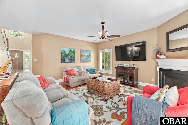 116 Swan View Dr Lot 5, Kill Devil Hills, NC 27948 - living room featuring wood finished floors, baseboards, ceiling fan, and a glass covered fireplace