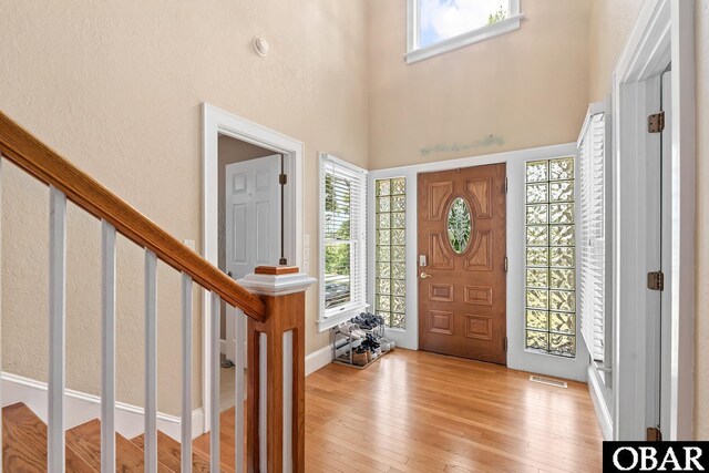 116 Swan View Dr Lot 5, Kill Devil Hills, NC 27948 - entryway with light wood finished floors, stairs, and a high ceiling