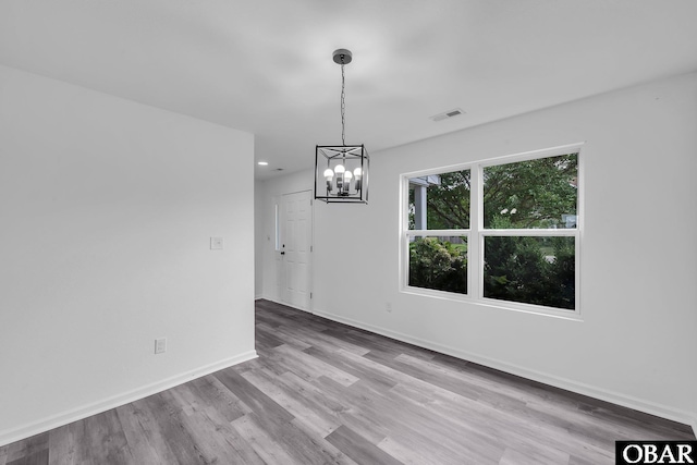113 Otter Way Lot 68, South Mills, NC 27976 - unfurnished dining area featuring wood finished floors, a chandelier, and recessed lighting