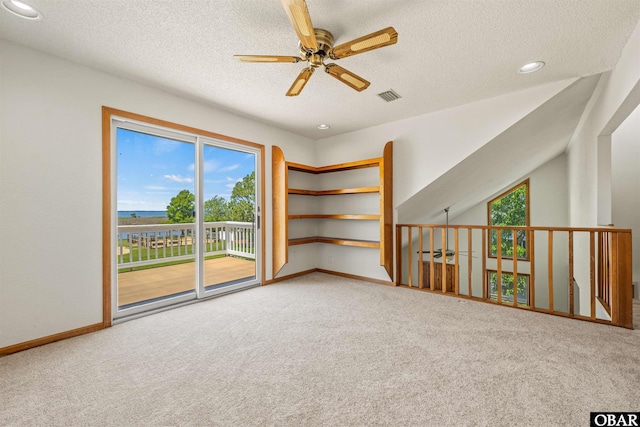 4005 Ivy Ln Lot # 16, Kitty Hawk, NC 27949 - spare room with carpet flooring, a ceiling fan, a textured ceiling, baseboards, and recessed lighting