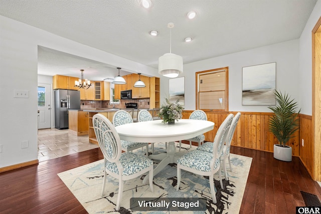 4005 Ivy Ln Lot # 16, Kitty Hawk, NC 27949 - dining area featuring a chandelier, wainscoting, light wood finished floors, wooden walls, and recessed lighting