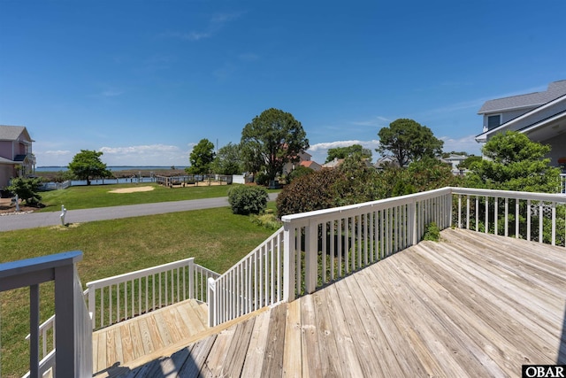 4005 Ivy Ln Lot # 16, Kitty Hawk, NC 27949 - deck featuring a yard and a water view
