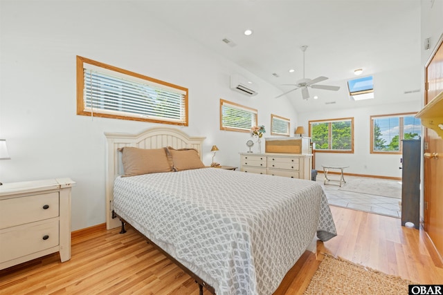 4005 Ivy Ln Lot # 16, Kitty Hawk, NC 27949 - bedroom with a skylight, light wood-style floors, vaulted ceiling, baseboards, and recessed lighting