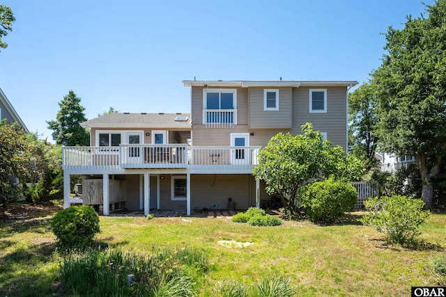 4005 Ivy Ln Lot # 16, Kitty Hawk, NC 27949 - back of house with a wooden deck and a lawn