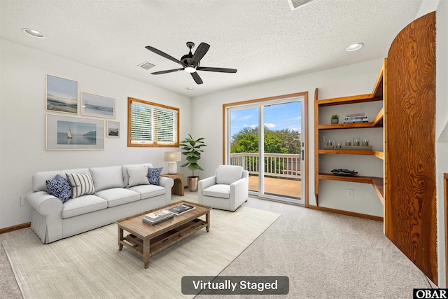 4005 Ivy Ln Lot # 16, Kitty Hawk, NC 27949 - living room with carpet, a textured ceiling, a ceiling fan, baseboards, and recessed lighting