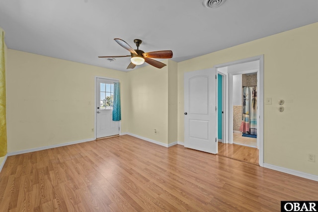 1612 Harbour View Dr Lot 114, Kill Devil Hills, NC 27948 - empty room featuring light wood-style flooring, ceiling fan, and baseboards