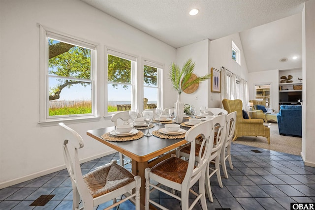 506 Magnolia Way Lot 29, Corolla, NC 27927 - dining space with tile patterned flooring, a textured ceiling, recessed lighting, and lofted ceiling