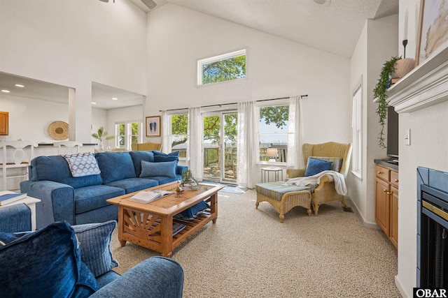 506 Magnolia Way Lot 29, Corolla, NC 27927 - living area with high vaulted ceiling and light carpet