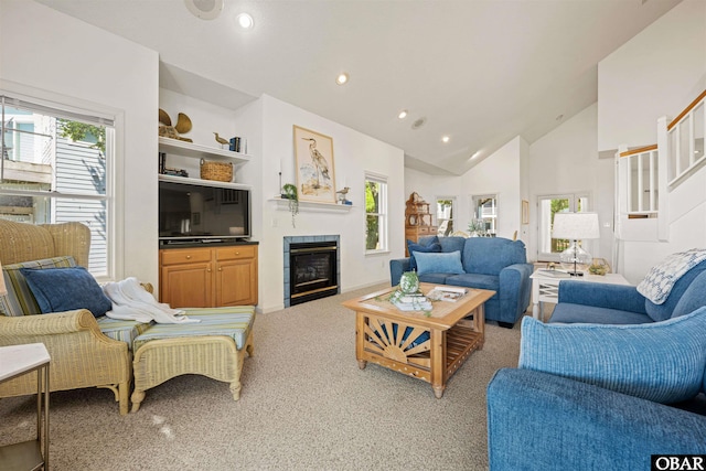 506 Magnolia Way Lot 29, Corolla, NC 27927 - living room with carpet flooring, recessed lighting, a glass covered fireplace, and high vaulted ceiling