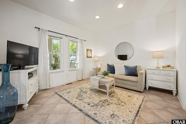 506 Magnolia Way Lot 29, Corolla, NC 27927 - living area with recessed lighting, light tile patterned floors, and vaulted ceiling