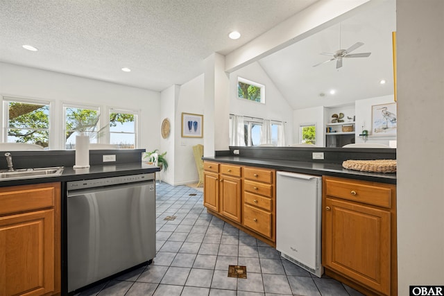 506 Magnolia Way Lot 29, Corolla, NC 27927 - kitchen featuring dishwasher, dark countertops, brown cabinets, and recessed lighting