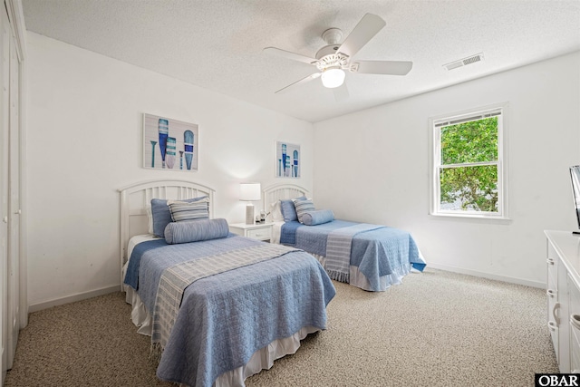 506 Magnolia Way Lot 29, Corolla, NC 27927 - bedroom featuring light carpet, a textured ceiling, and a ceiling fan